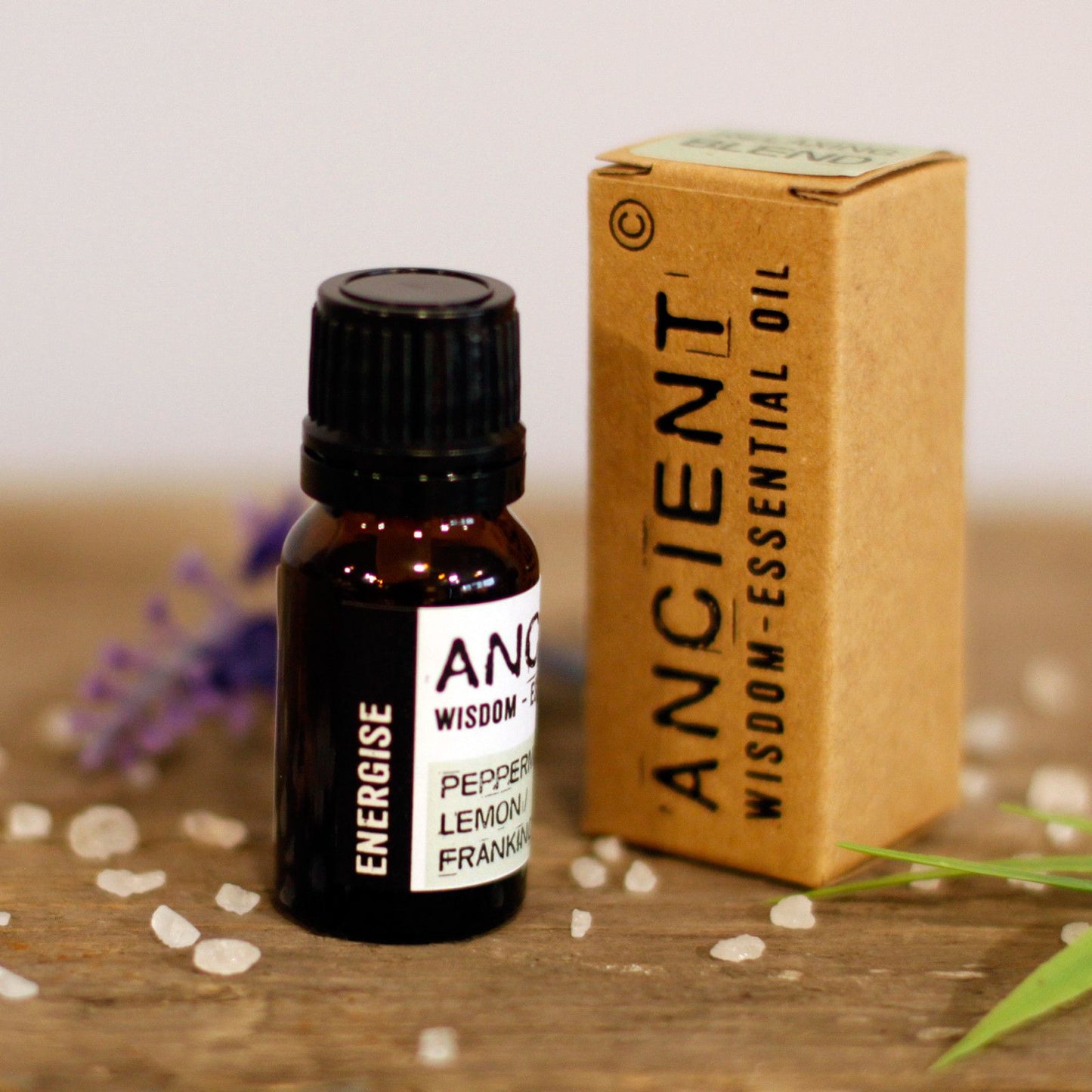 Energising botanical essential oil blend in a 10ml apothecary amber vial.