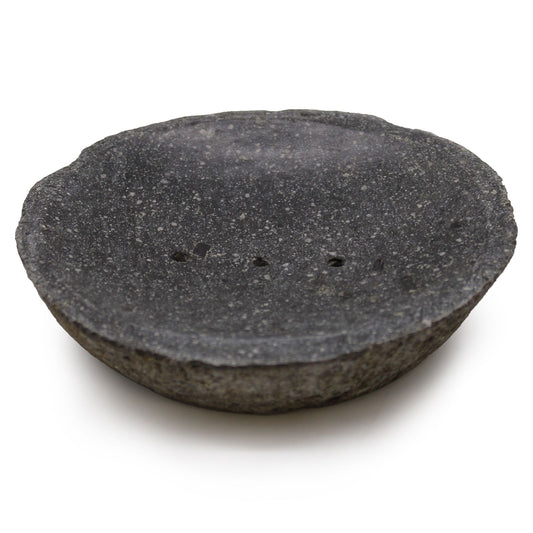Dark grey handcrafted natural riverstone soap dish with raw edges and drainage holes for artisan soap