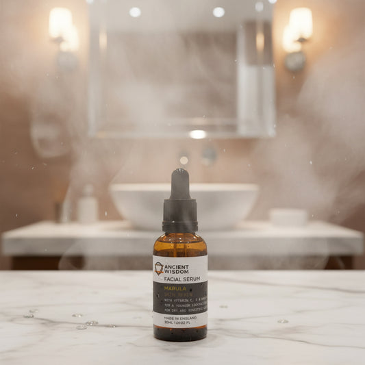 Amber glass dropper bottle of deeply nourishing Marula Oil facial serum, part of the Glan & Hearth curated apothecary skincare collection.