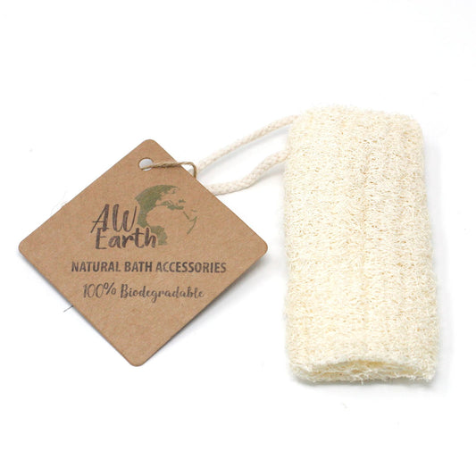 Natural fibrous luffa gourd exfoliation scrub with hanging rope for sustainable bathroom use.